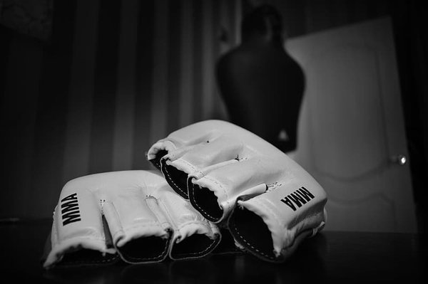 pair-of-white-mma-gloves-on-table.jpg