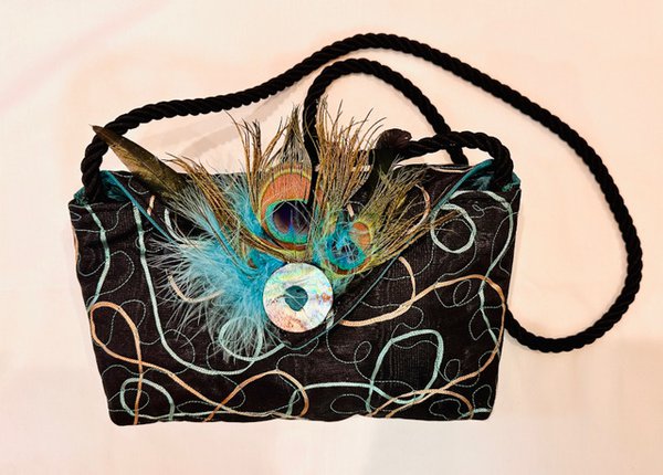 CharlestonCraftsGalleryLynn Gettelfinger Peacock feather purse.jpeg